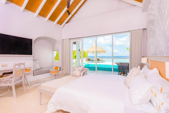 Sunrise Beach Pool Villa de Malahini Kuda Bandos con piscina privada frente al mar