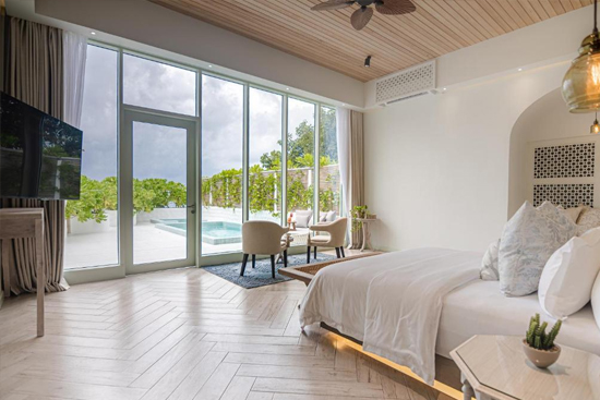 Sunset Beach Pool Suite de Malahini Kuda Bandos al atardecer