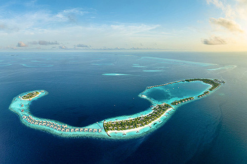 Vista aérea de Waldorf Astoria Maldives Ithaafushi y sus tres islas